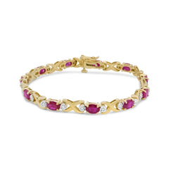 14K Yellow Gold 1/4 Cttw Diamond and Oval Red Ruby Alternating X Link Bracelet (I-J Color, I3 Clarity)